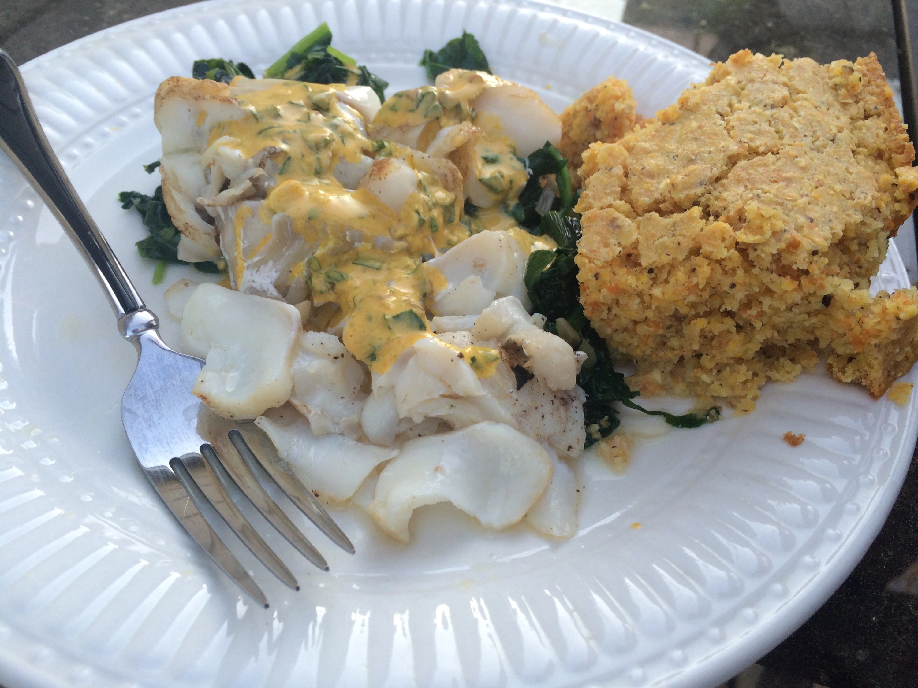 Haddock with ramps, spinach, and yogurt-ramp dressing